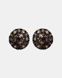 Pareja de pendientes de botón circulares Bohemme con pavé de circonitas champagne sobre plata oxidada.