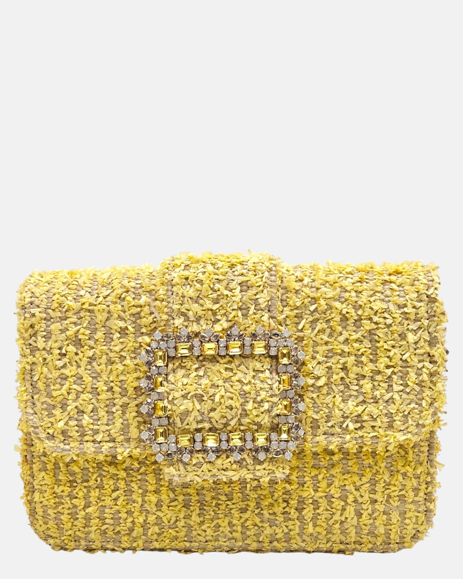parte delantera de un bolso estructurado de Emanuela Caruso elaborado en un tejido texturizado, decorado con una gran hebilla dorada central recubierta de piedras de cristal claras y amarillas.