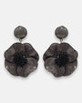 Pareja de pendientes grandes en forma de mariposa exótica de Ciléa Paris, mostrando sus alas rojas satinadas, base negra brillante y perfiles dorados.