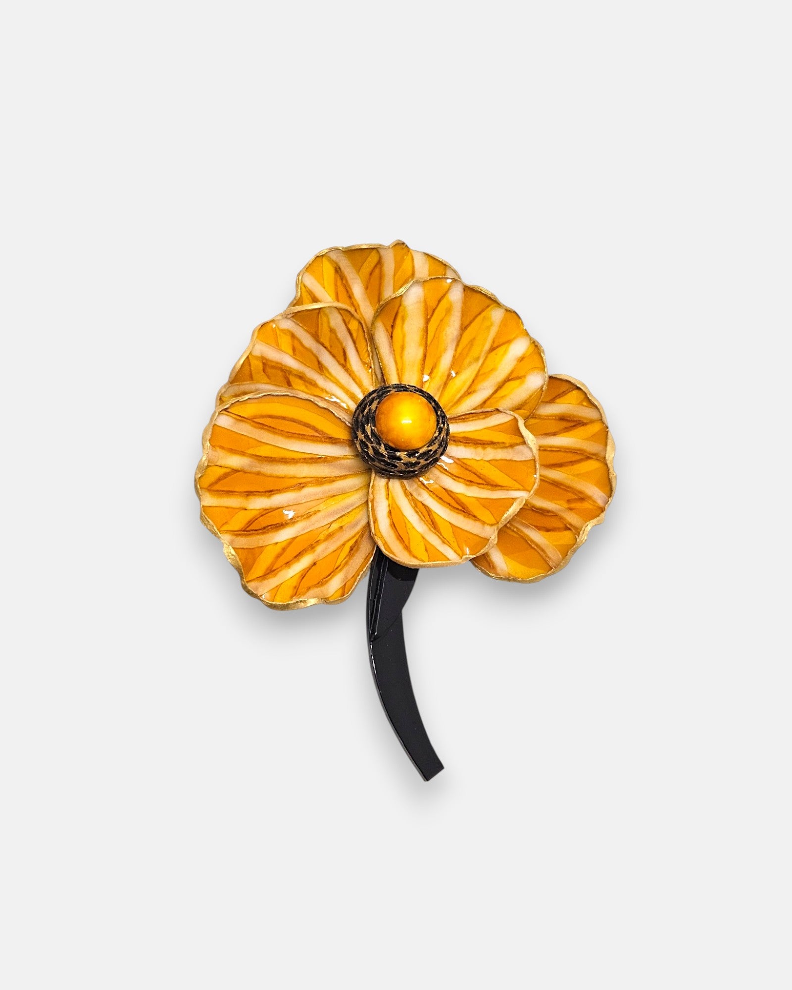 Gran broche maxi en forma de hoja tropical calada de Ciléa Paris, mostrando su diseño orgánico en color negro azabache esmaltado y brillante.
