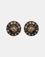 Pareja de pendientes de botón circulares Bohemme con pavé de circonitas champagne sobre plata oscura.