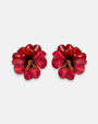 pareja de pendientes con forma de flor de pensamiento de Ciléa Paris, destacando sus pétalos superiores rojo oscuro y sus pétalos inferiores en color fucsia o rosa intenso brillante.