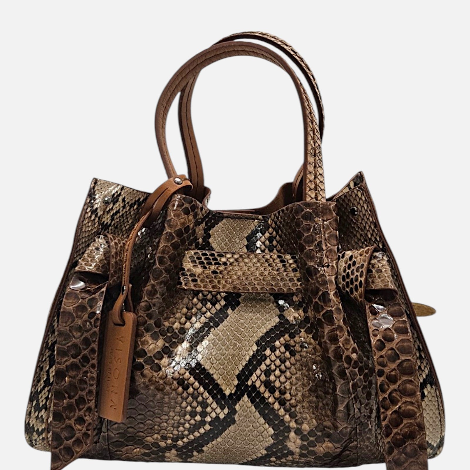 Bolso Pitón Pitagora de Plinio Visonà en piel estampada de serpiente con nudos laterales y etiqueta colgante de la firma.