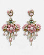 Pendientes Candelabro Flor Rosa Pastel de Dublos dispuesto sobre fondo blanco.