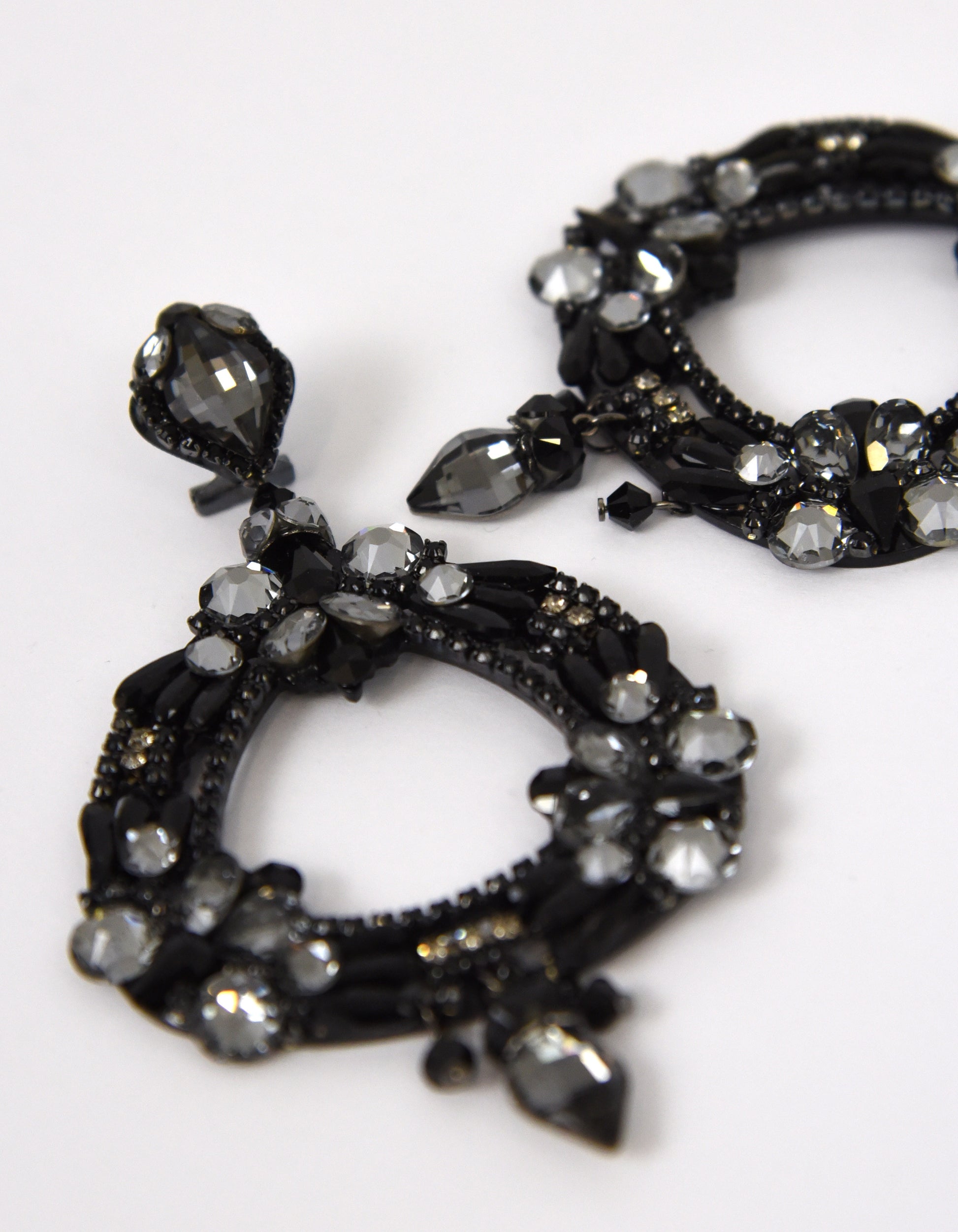 Triangle hoop earrings with black crystals 