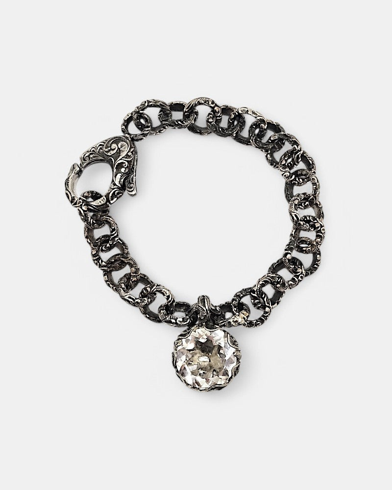 Pulsera de plata tallada a mano con cristal de roca