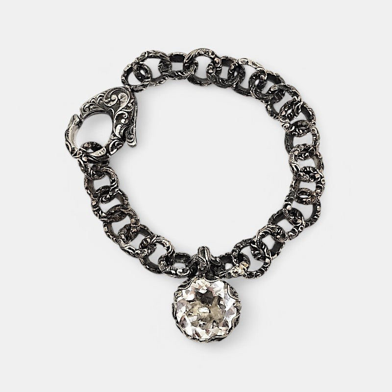 Pulsera de plata tallada a mano con cristal de roca