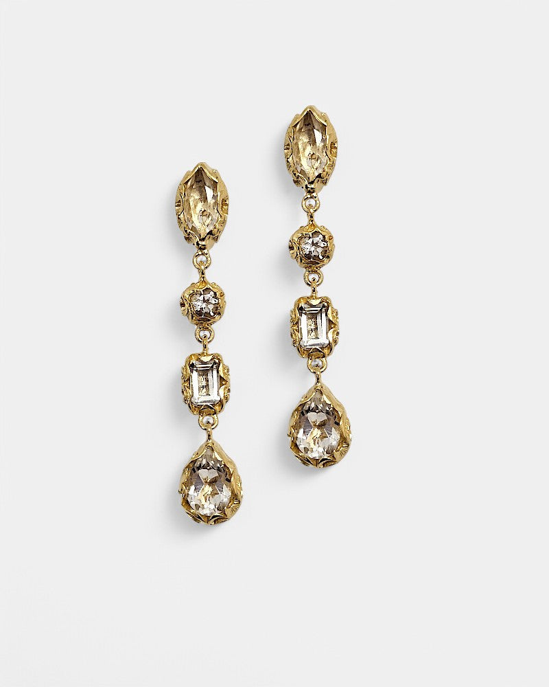 Pendientes de plata dorados tallados a mano con piedras