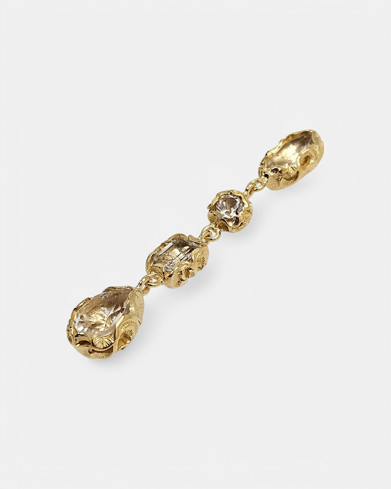 Pendientes de plata dorados tallados a mano con piedras