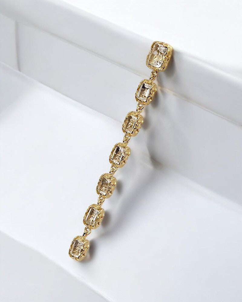 Pendientes de plata dorados tallados a mano con piedras