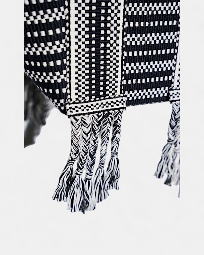 Bolso tejido y piel bicolor blanco y negro