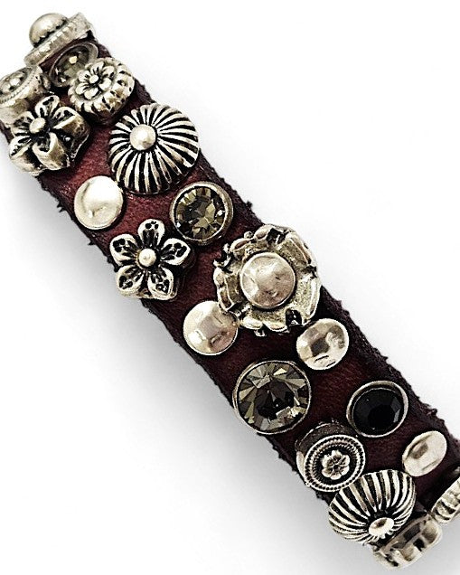 Pulsera Campomaggi piel y tachas granate