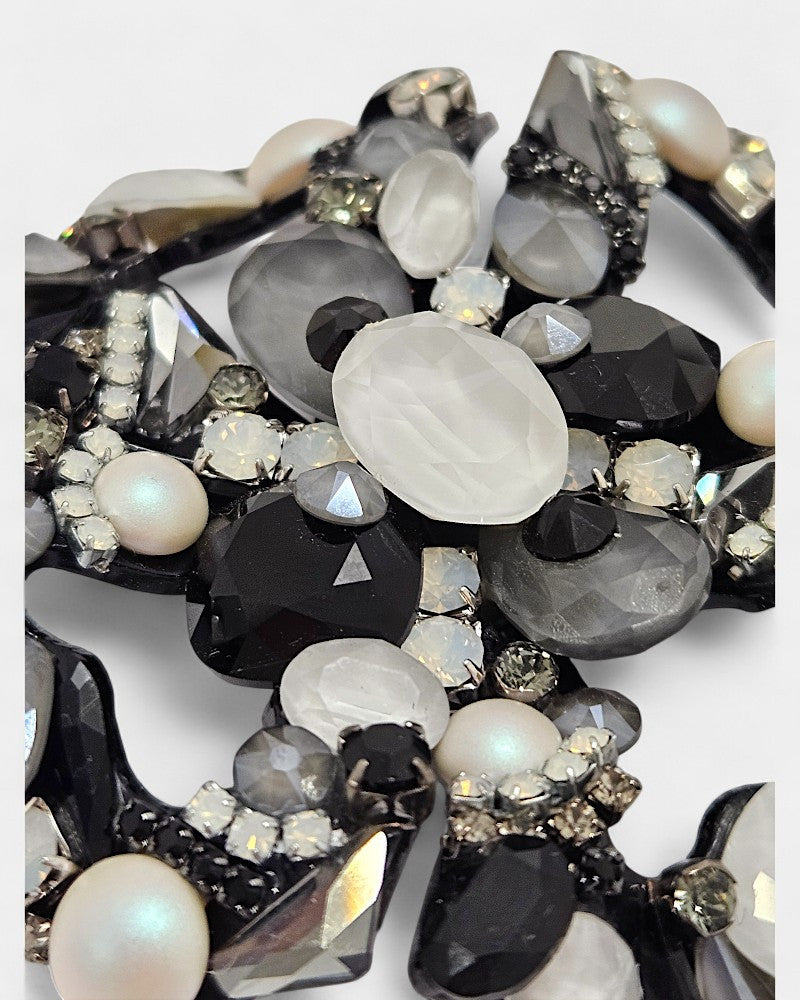 Broche swarovski blanco y negro Dualis