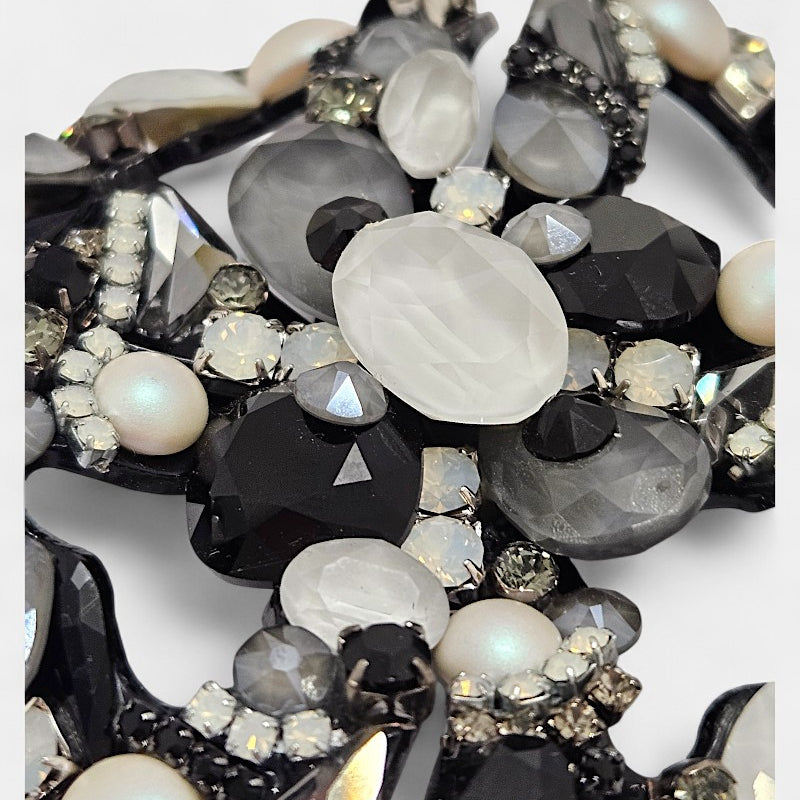 Broche swarovski blanco y negro Dualis