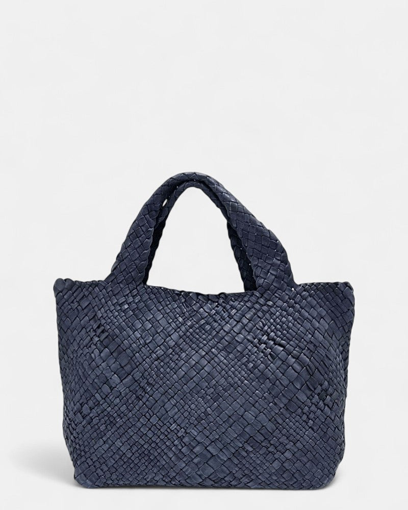 Bolso de mano en piel trenzada azul