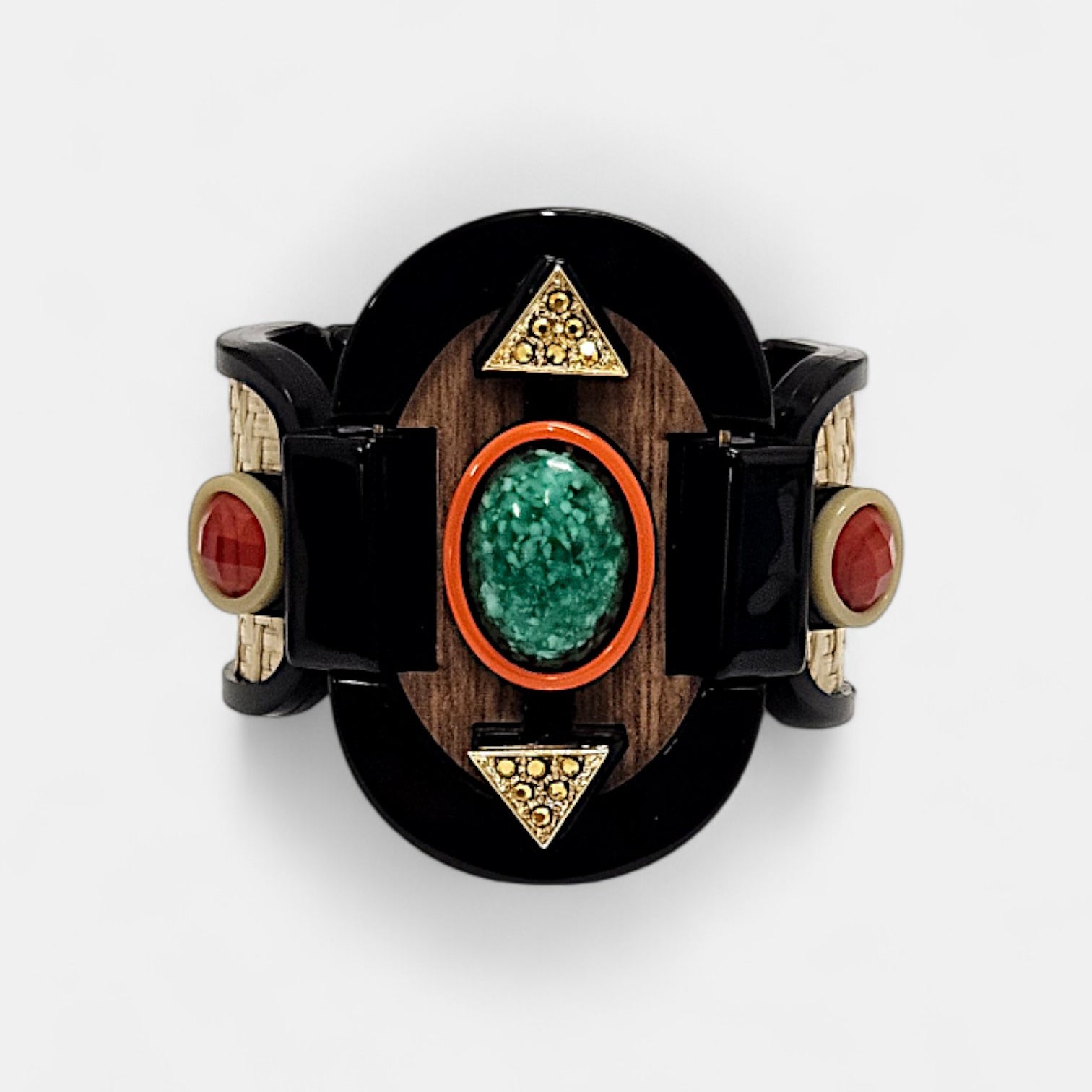 Brazalete Art Déco con piedras en verde esmeralda y rojo coral