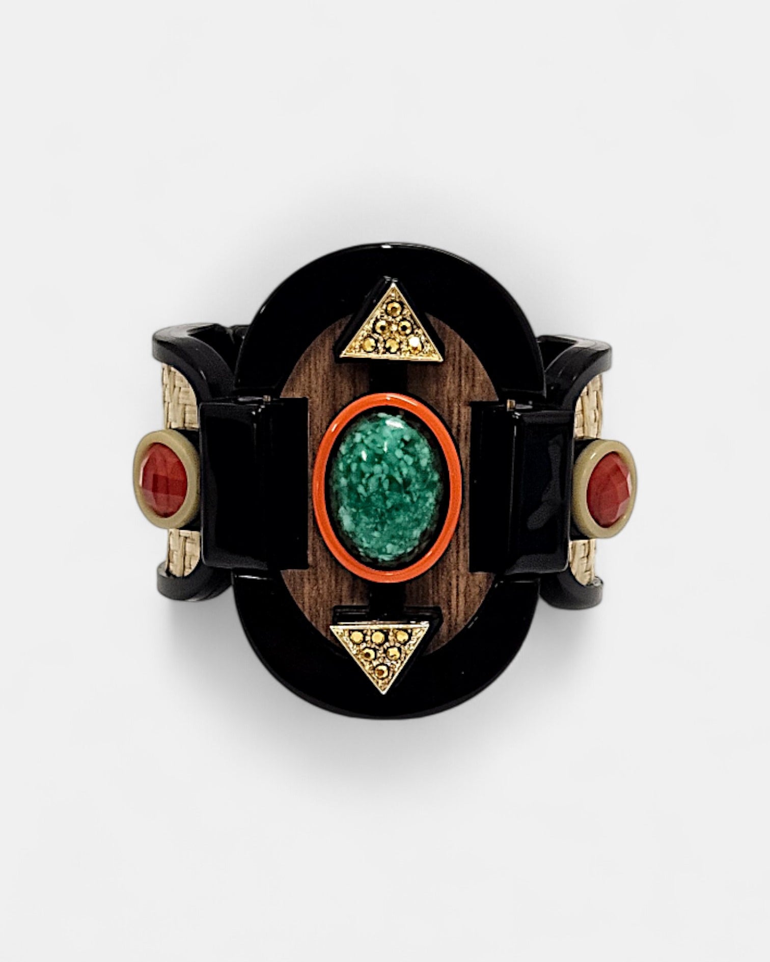 Brazalete Art Déco con piedras en verde esmeralda y rojo coral