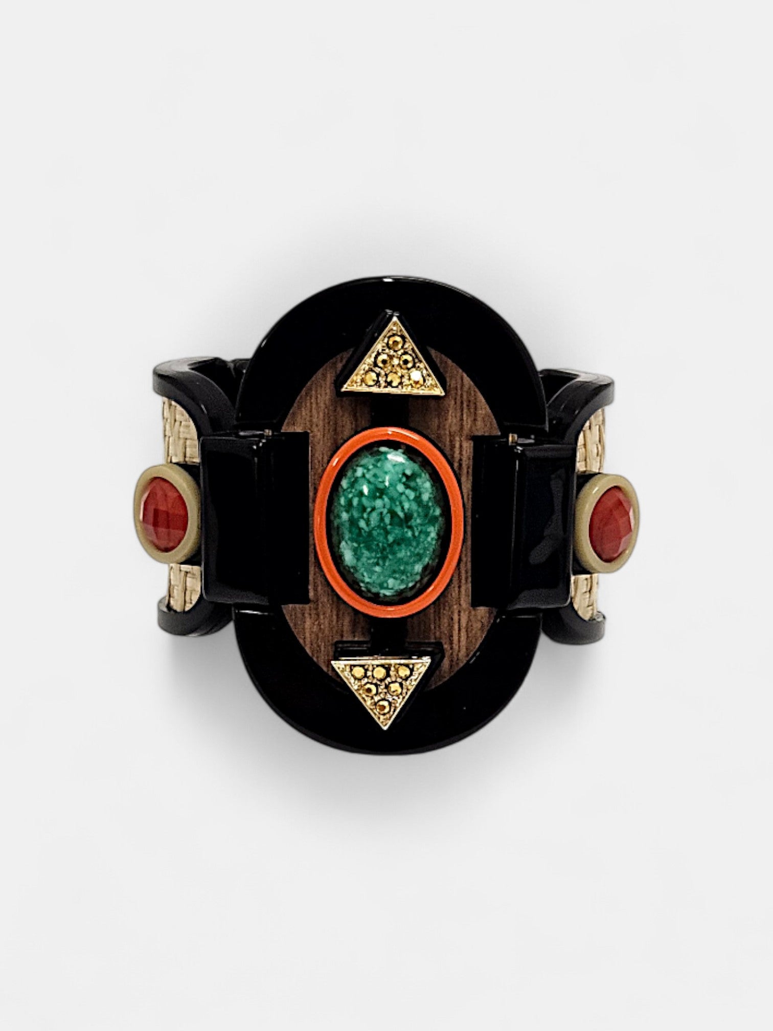 Brazalete Art Déco con piedras en verde esmeralda y rojo coral