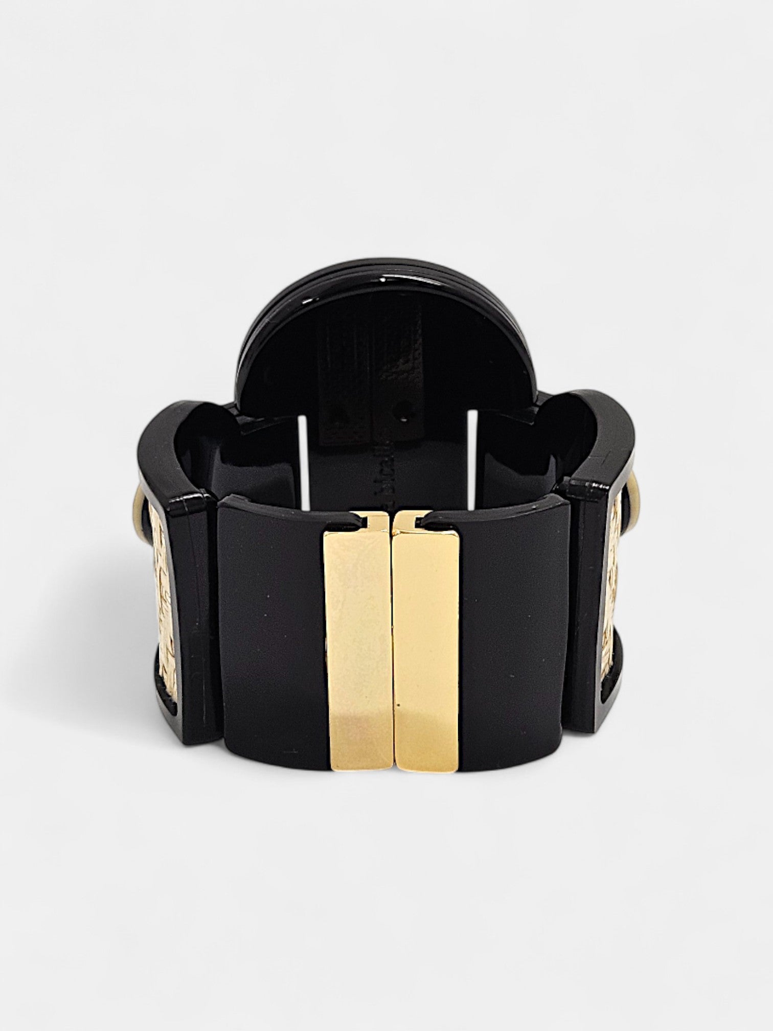 Brazalete Art Déco con piedras en verde esmeralda y rojo coral