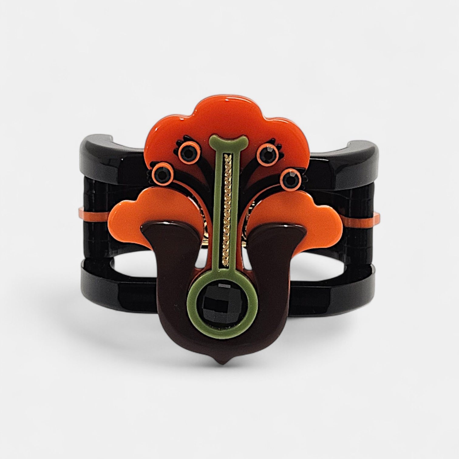 Brazalete Art Déco floral en resina negra