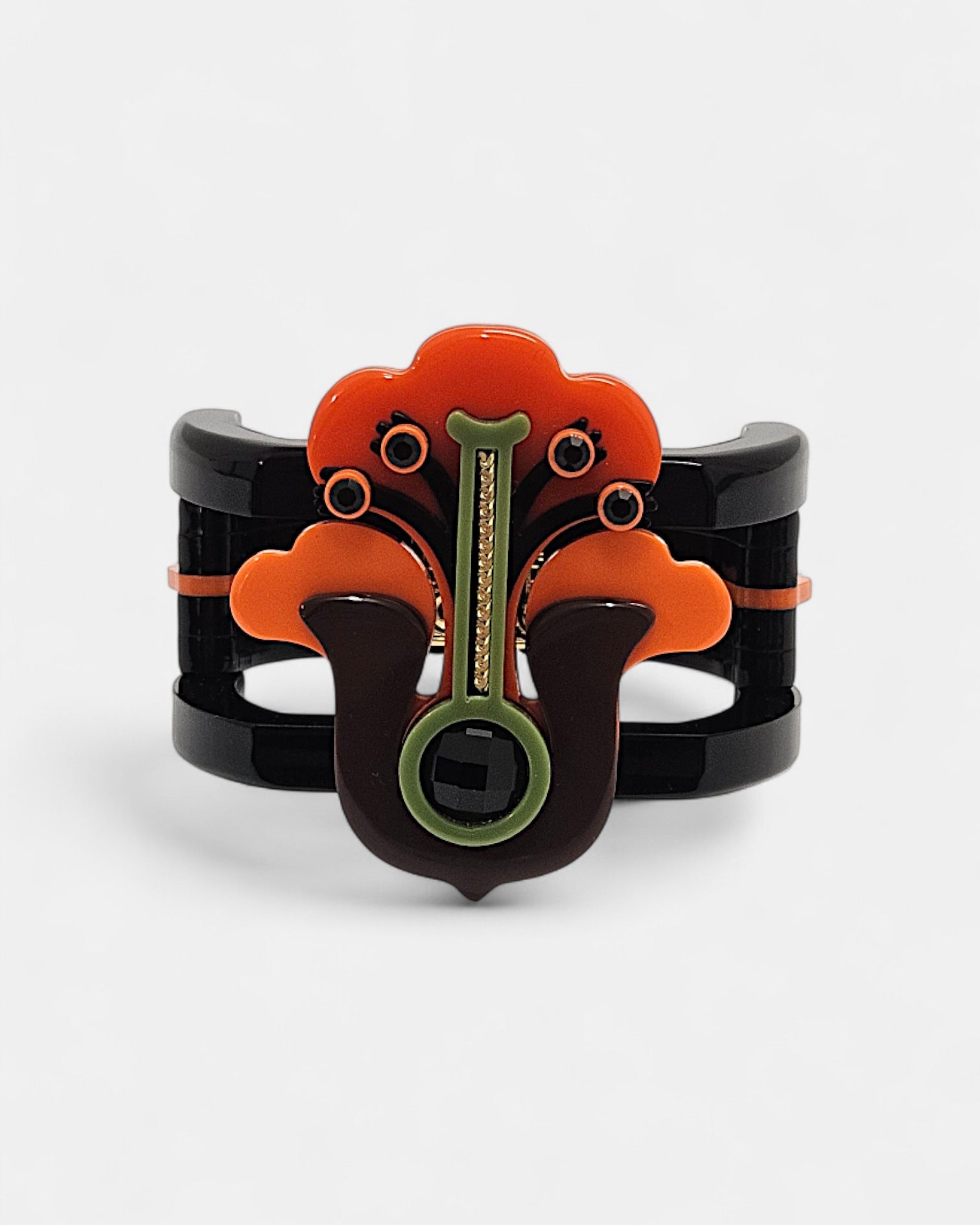 Brazalete Art Déco floral en resina negra