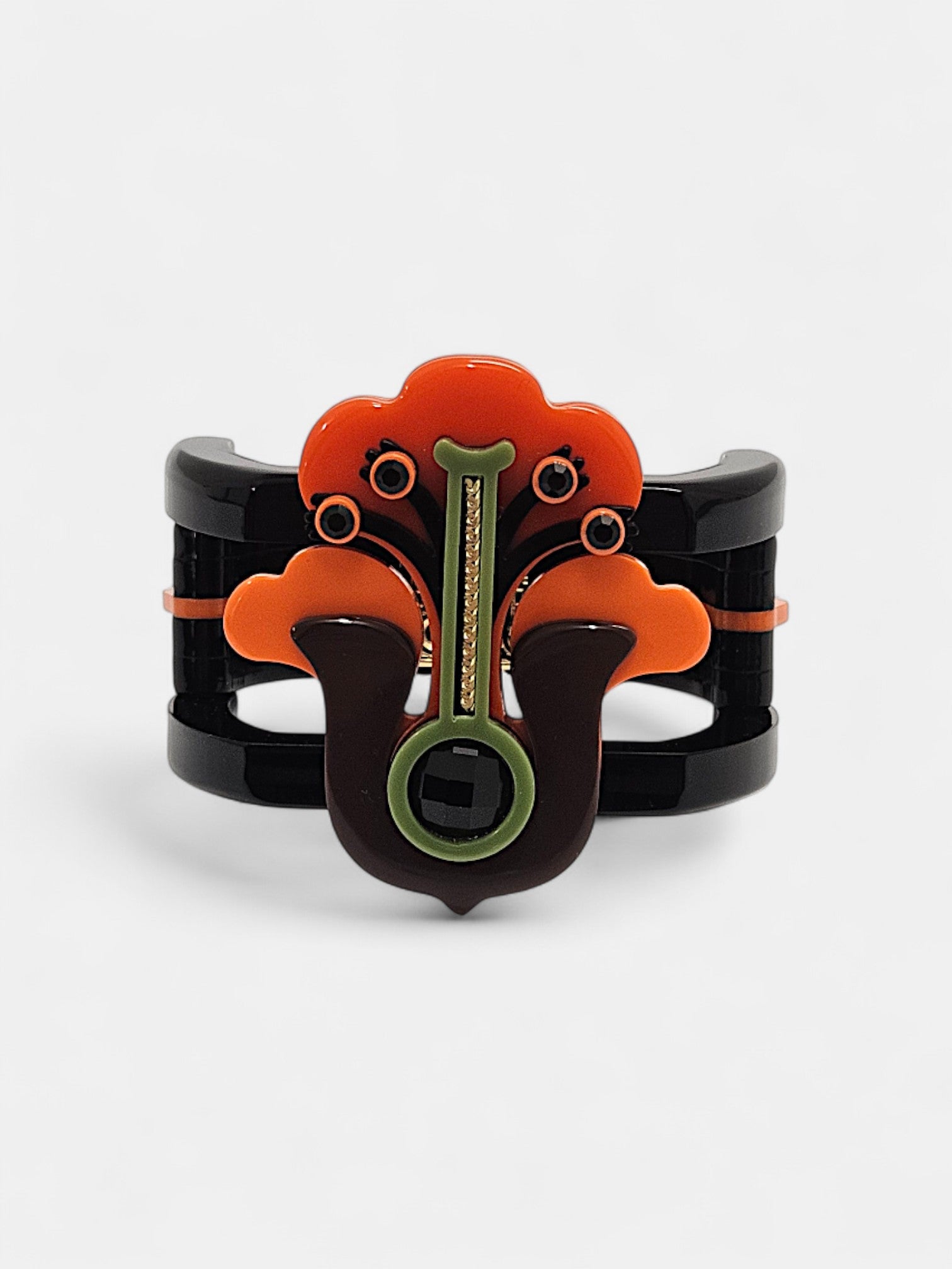 Brazalete Art Déco floral en resina negra