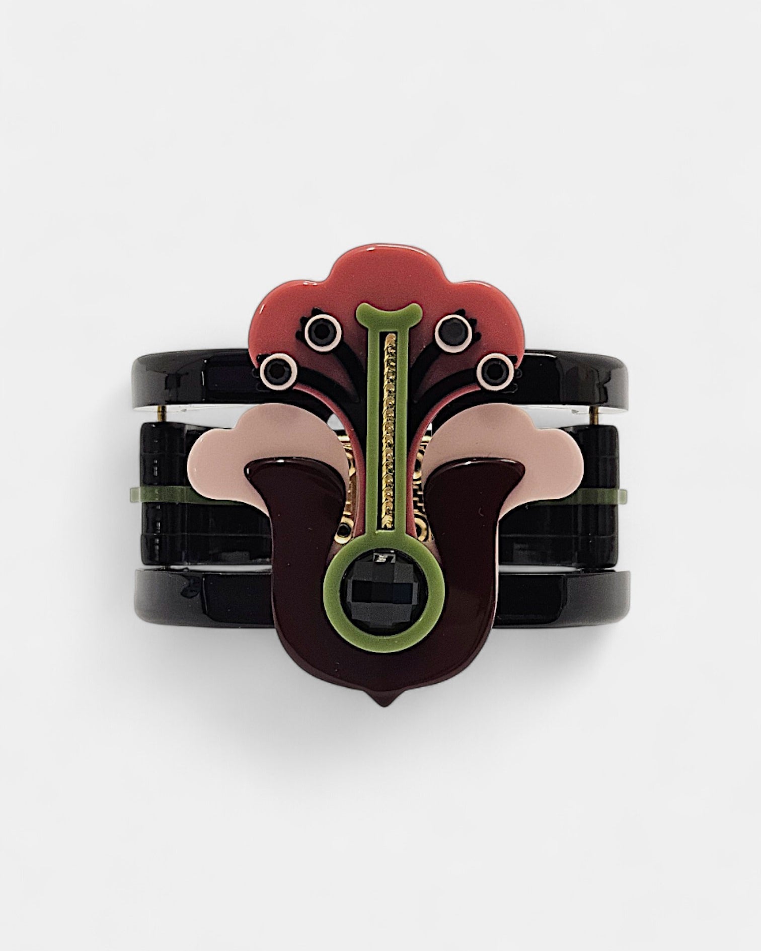 Brazalete Art Déco floral en resina rosa y negro