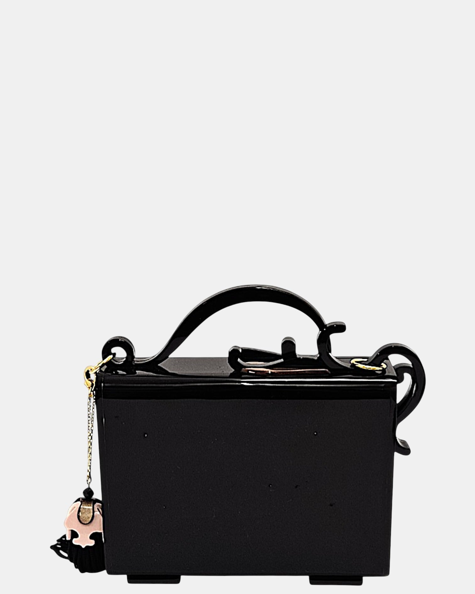 Bolso Gissa Bicalho de metacrilato negro con flores en relieve