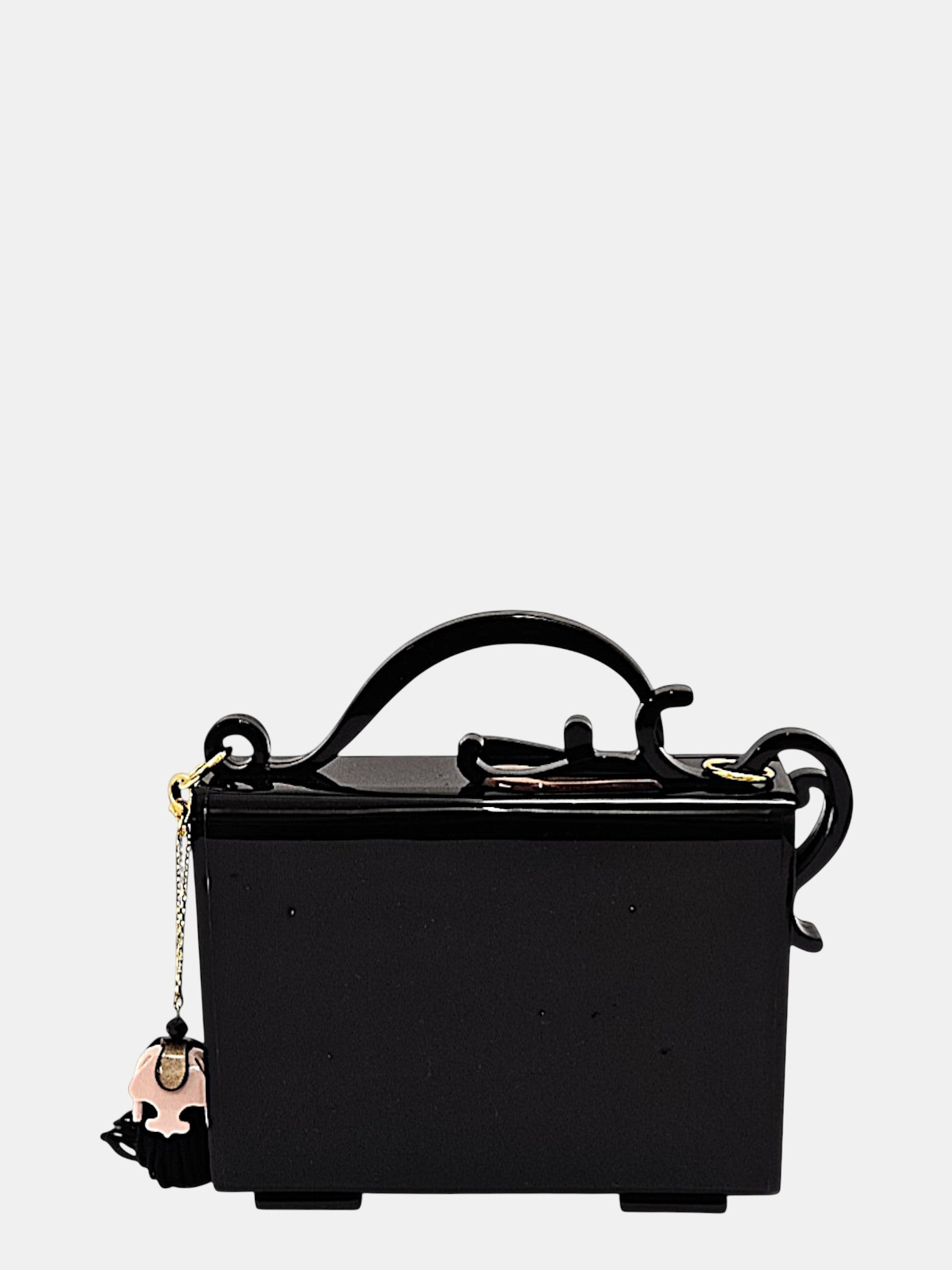 Bolso Gissa Bicalho de metacrilato negro con flores en relieve