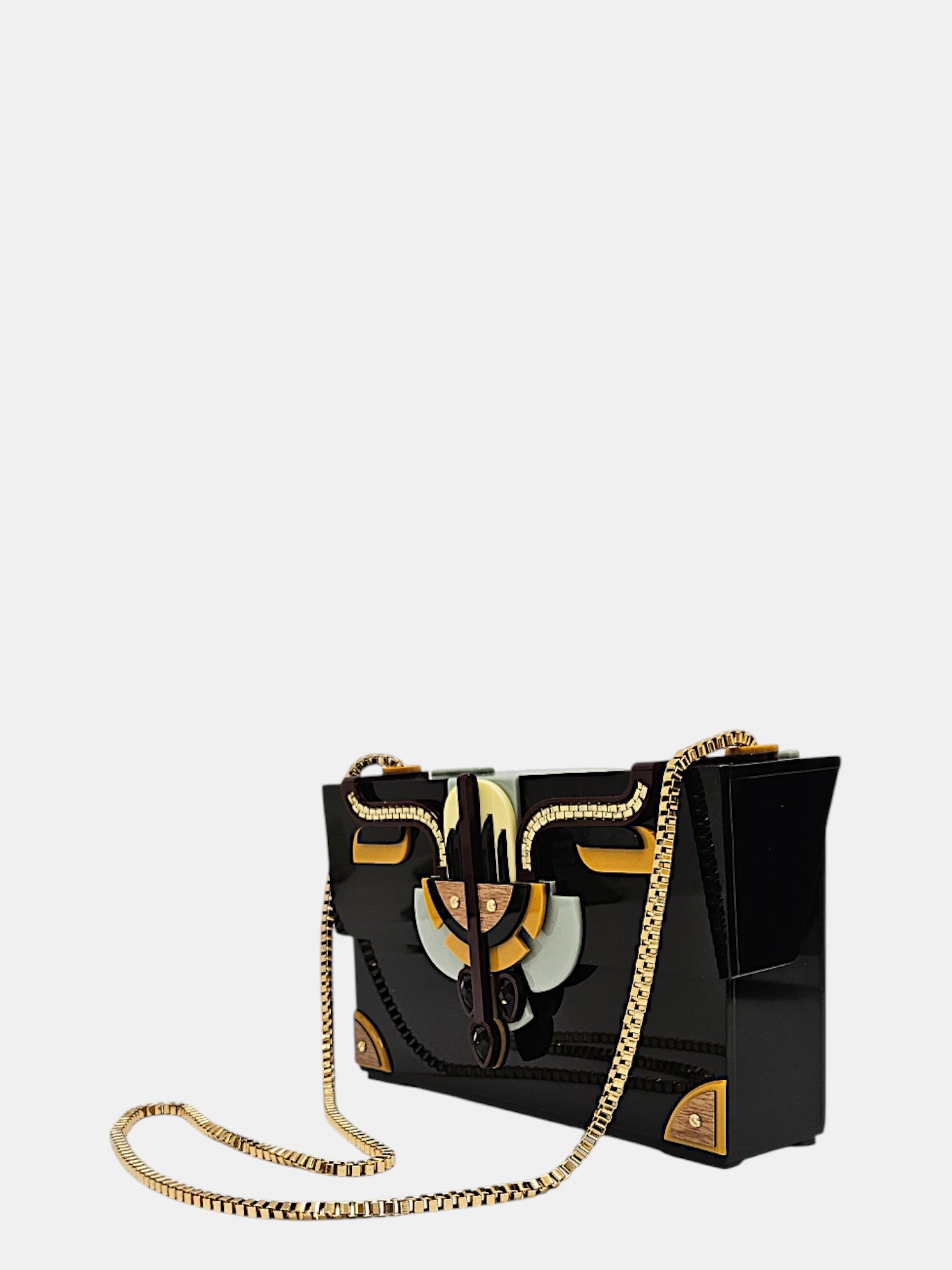 Clutch Gissa Bicalho negro acrílico con cadena dorada