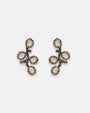 Pareja de pendientes Tataborello con diseño de rama y cuatro cristales transparentes.