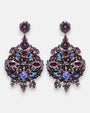 Pareja de pendientes grandes de gota Barroco Champaña de la firma Dublos, mostrando su gran diseño de lágrima calada con cristales champaña, strass y abalorios bronce.