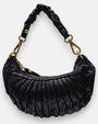 bolso Donatella de piel azul noche con plizado vertical, silueta media luna y asa fruncida con mosquetones dorados.
