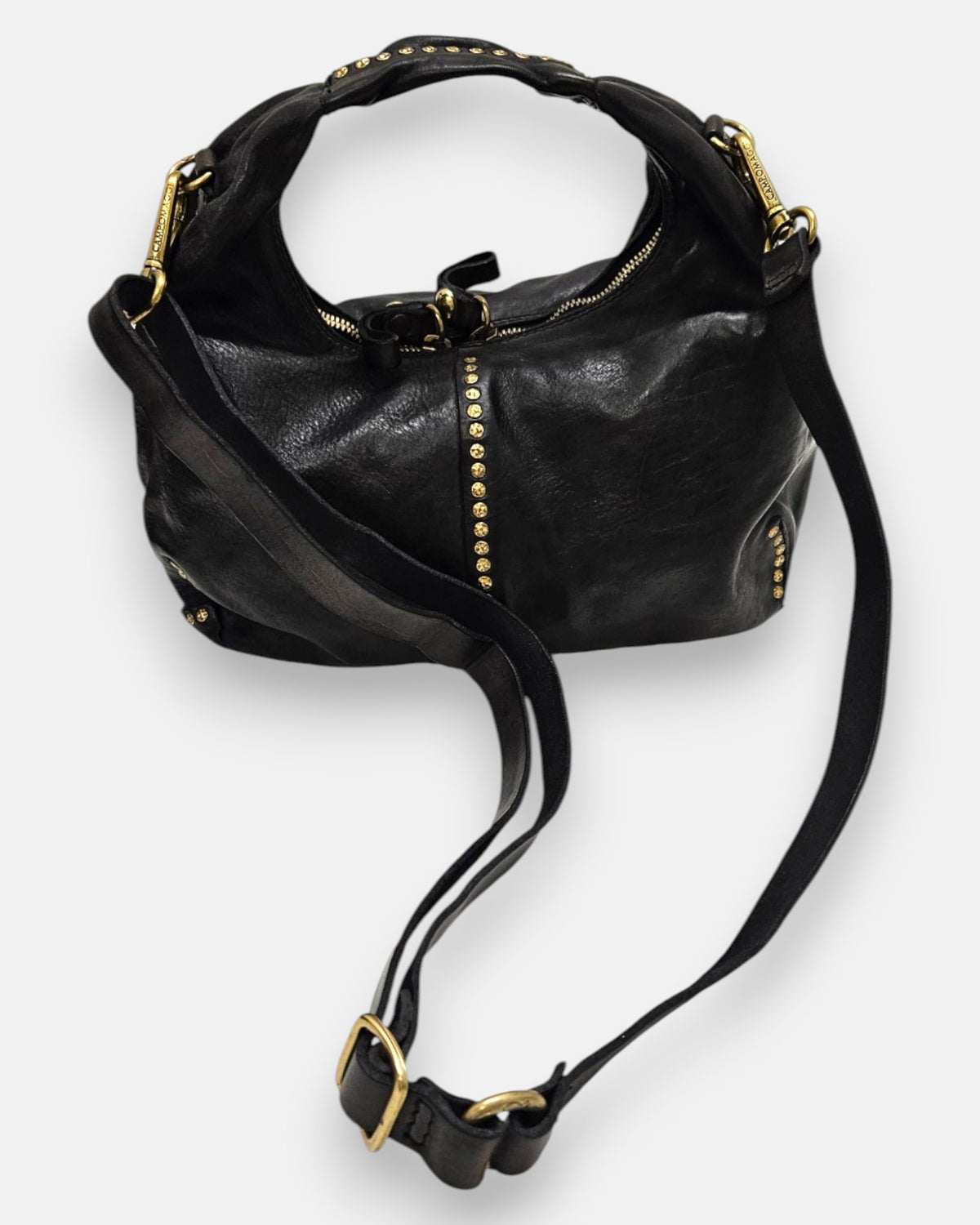 bolso Valentina completo junto a su correa larga de piel ajustable y extraíble, lista para llevar en posición cruzada.