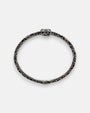 pulsera rígida Caterina de Maria e Luisa Jewels en plata 925 bruñida calada con cristal central esmeralda.