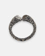 pulsera rígida Sibilla de Maria e Luisa Jewels en plata 925 bruñida labrada con gemas facetadas transparente y ahumada enfrentadas.