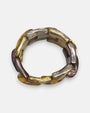 vista circular cenital de la pulsera elástica Chain Elastic Ambre, detallando la curvatura y flexibilidad de sus eslabones de resina.