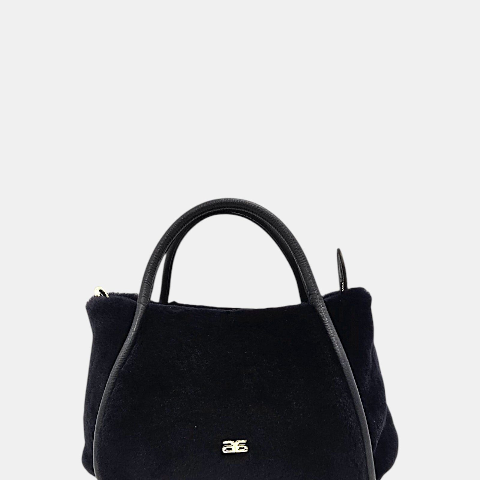 Bolso azul marino piel y borreguito