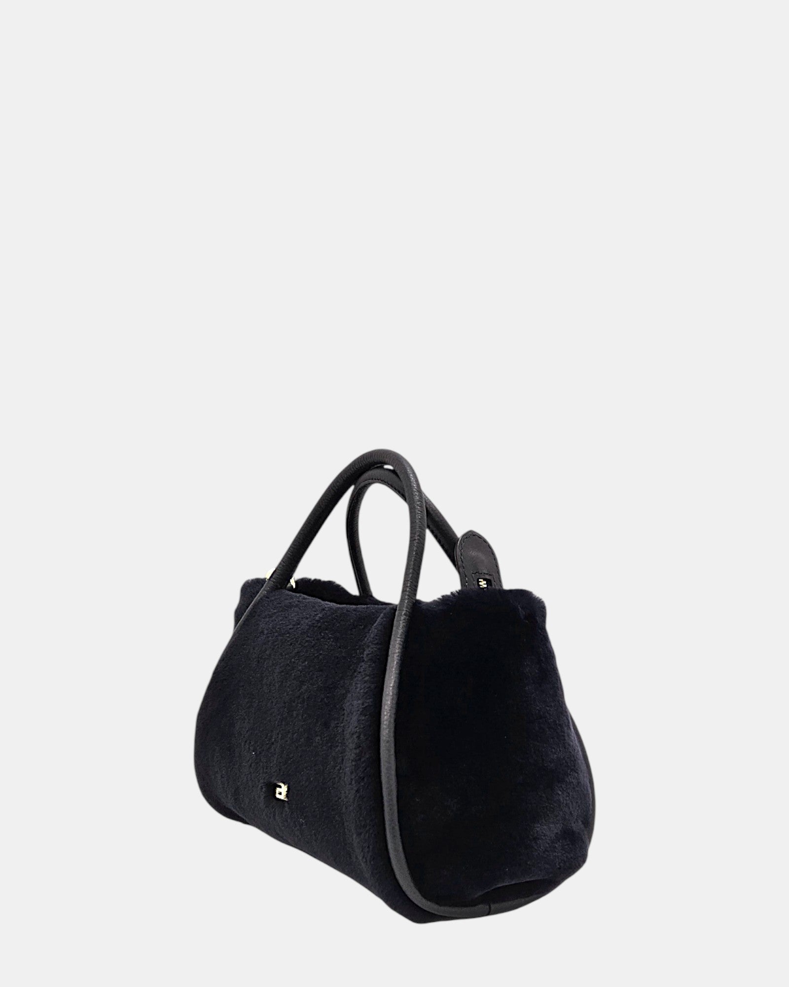 Bolso azul marino piel y borreguito