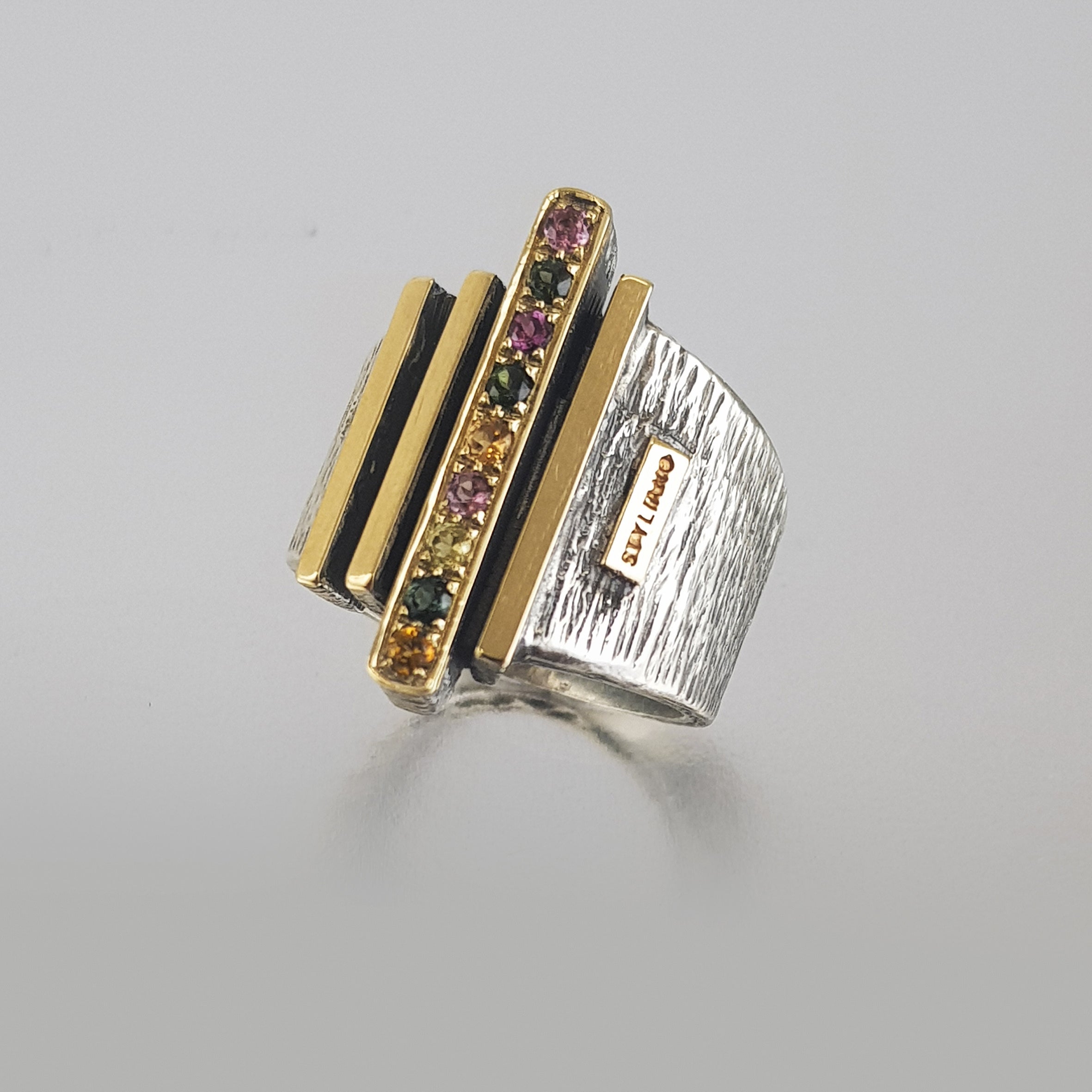 Sortija plata y oro con turmalinas