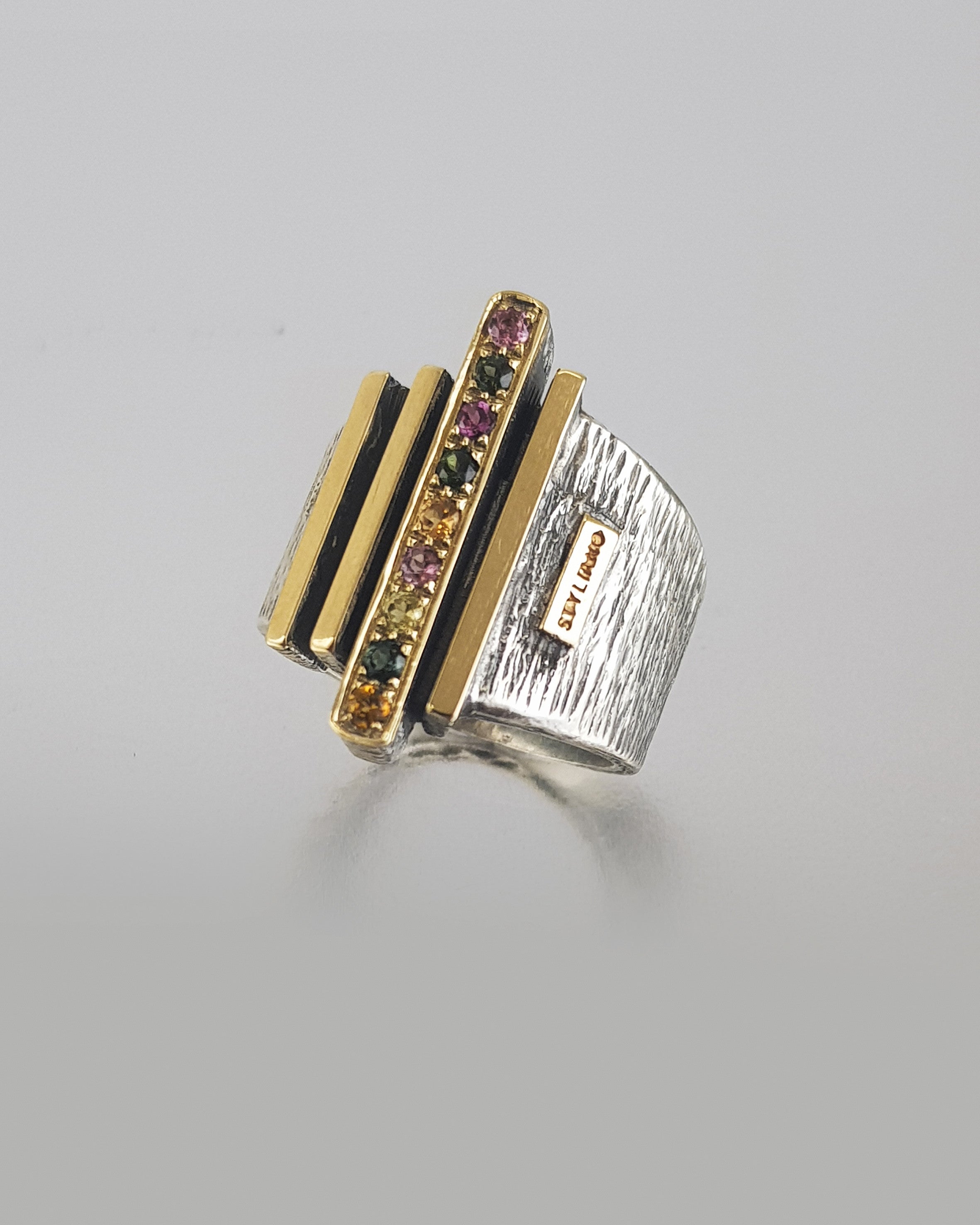 Sortija plata y oro con turmalinas