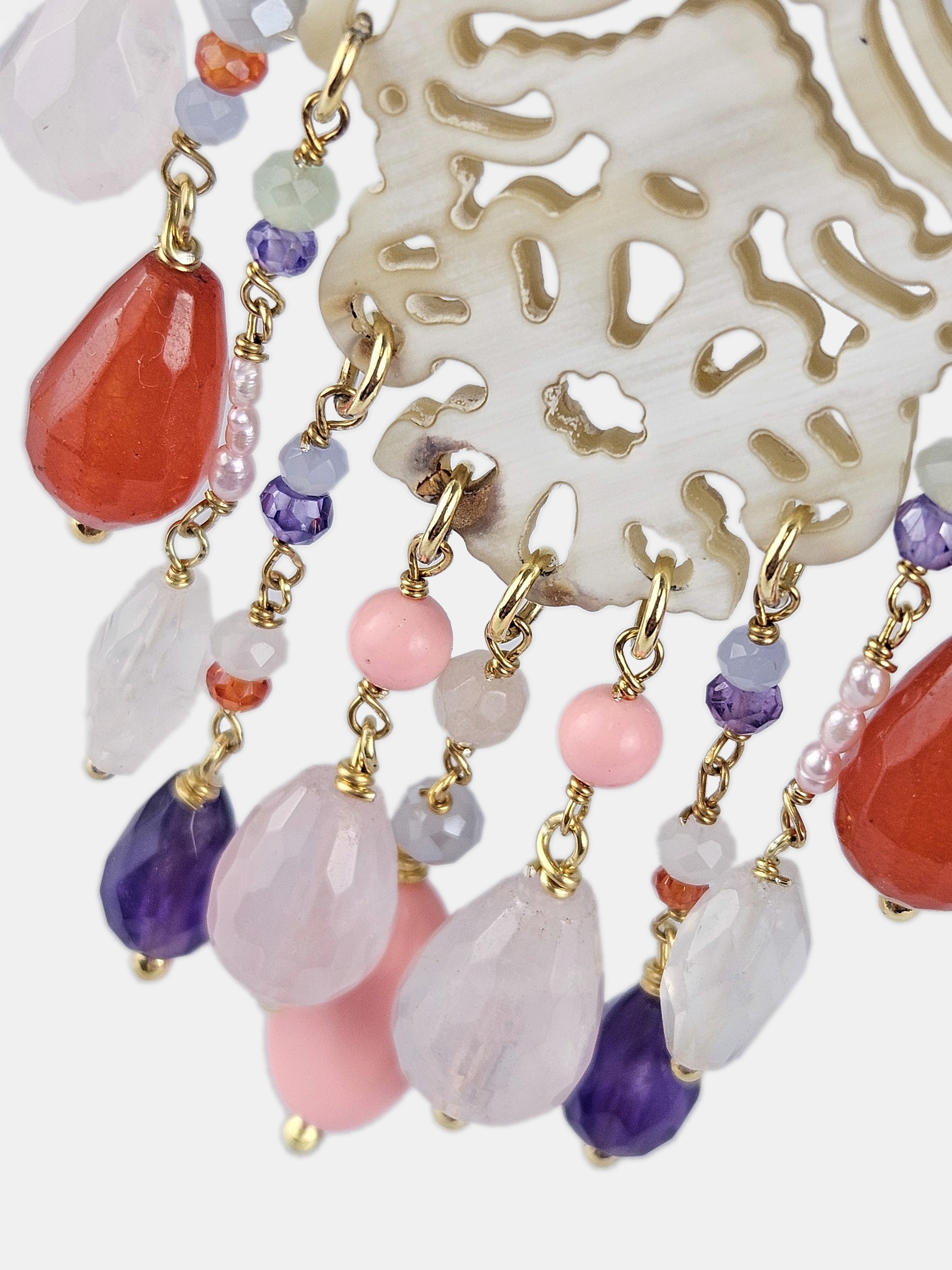 Pendientes asimétricos tamburello y filigrana