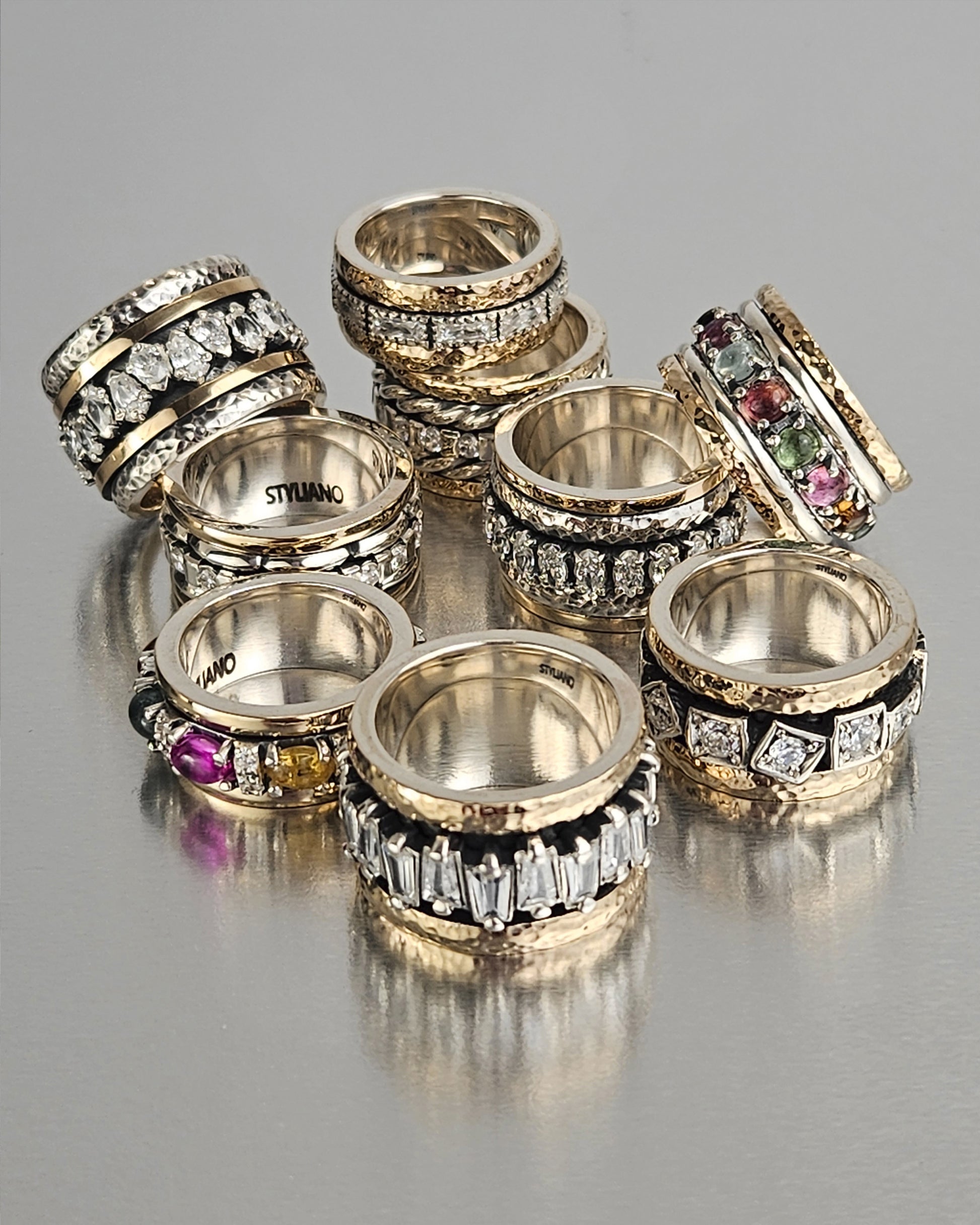 Anillo giratorio plata y zirconitas asimétricas