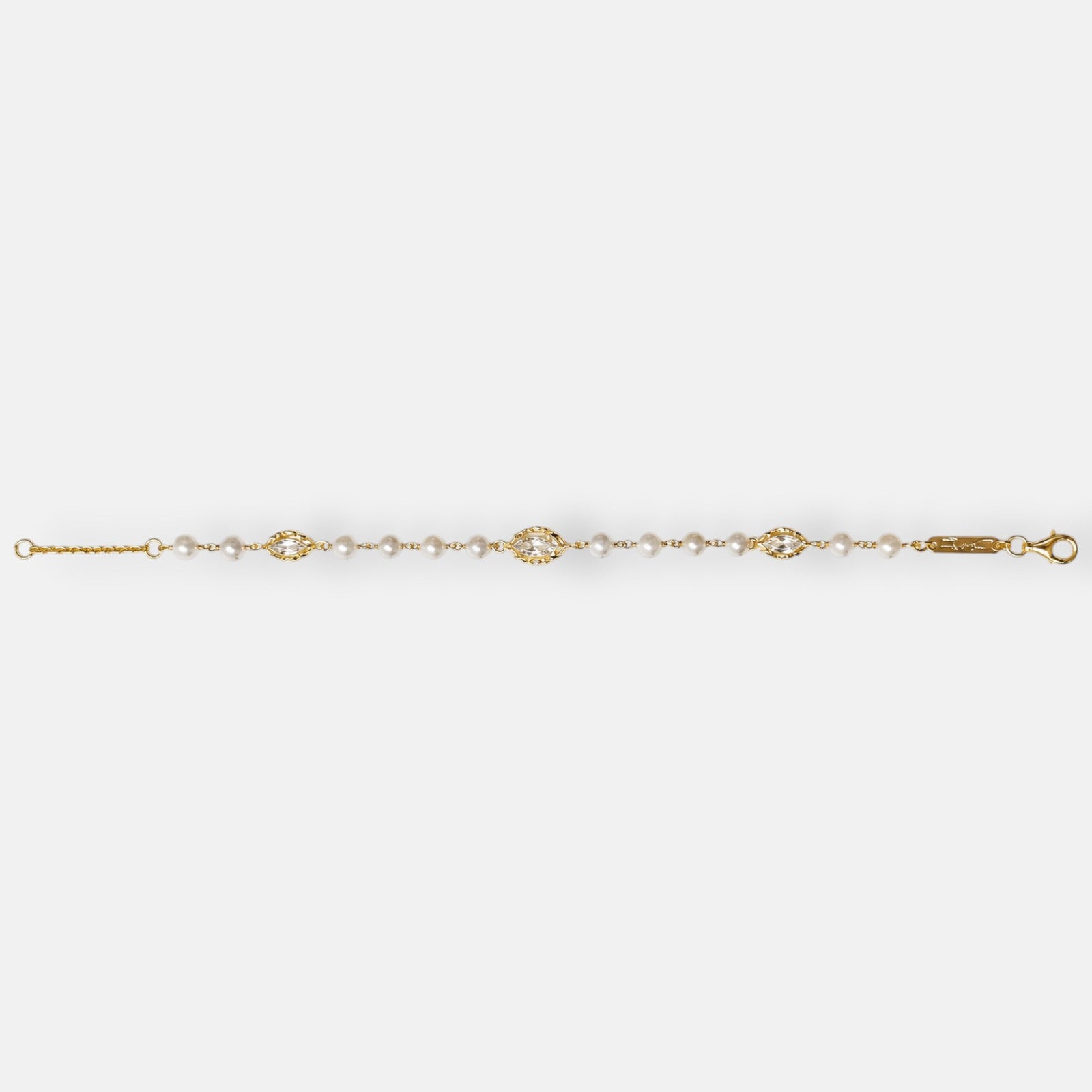pulsera Livia de Maria e Luisa Jewels en plata 925 chapada en oro con perlas y cristales transparentes en talla marquesa.