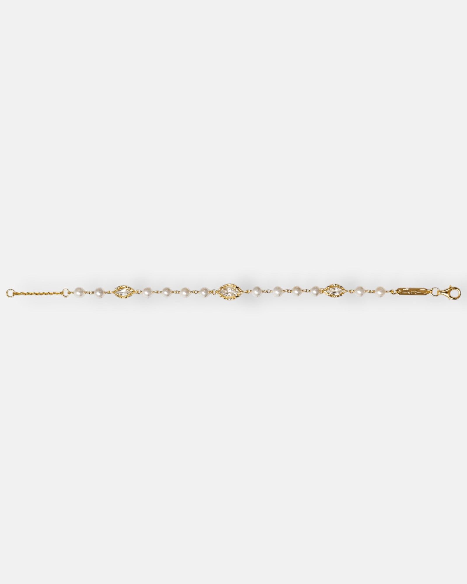 pulsera Livia de Maria e Luisa Jewels en plata 925 chapada en oro con perlas y cristales transparentes en talla marquesa.