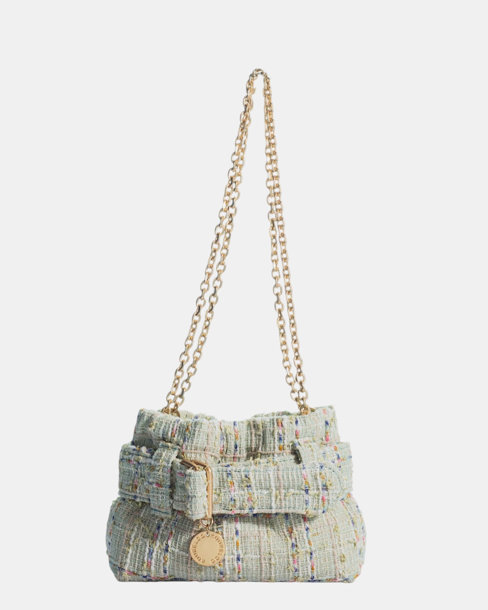 Bolso Kooreloo Pepper Mini Pistachio Tweed de tejido texturizado con cadena dorada.