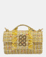 Bolso Kooreloo New Yorker en tweed amarillo vibrante con detalles de flecos y el icónico cierre dorado de seis círculos.