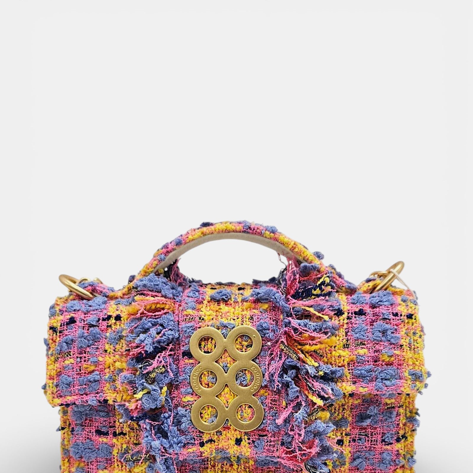 Bolso Kooreloo New Yorker Petite de tweed texturizado con logo de seis círculos dorados.