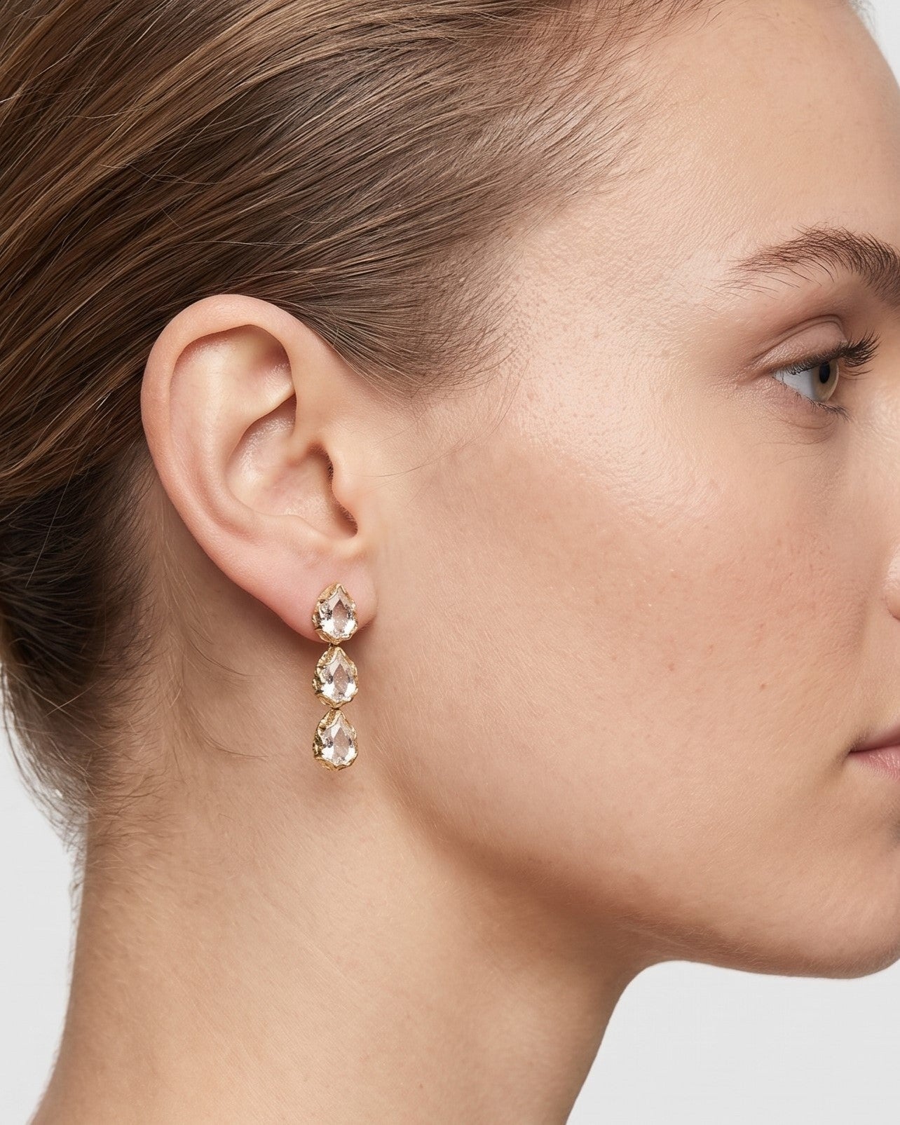 Livia gold earrings with teardrop crystals